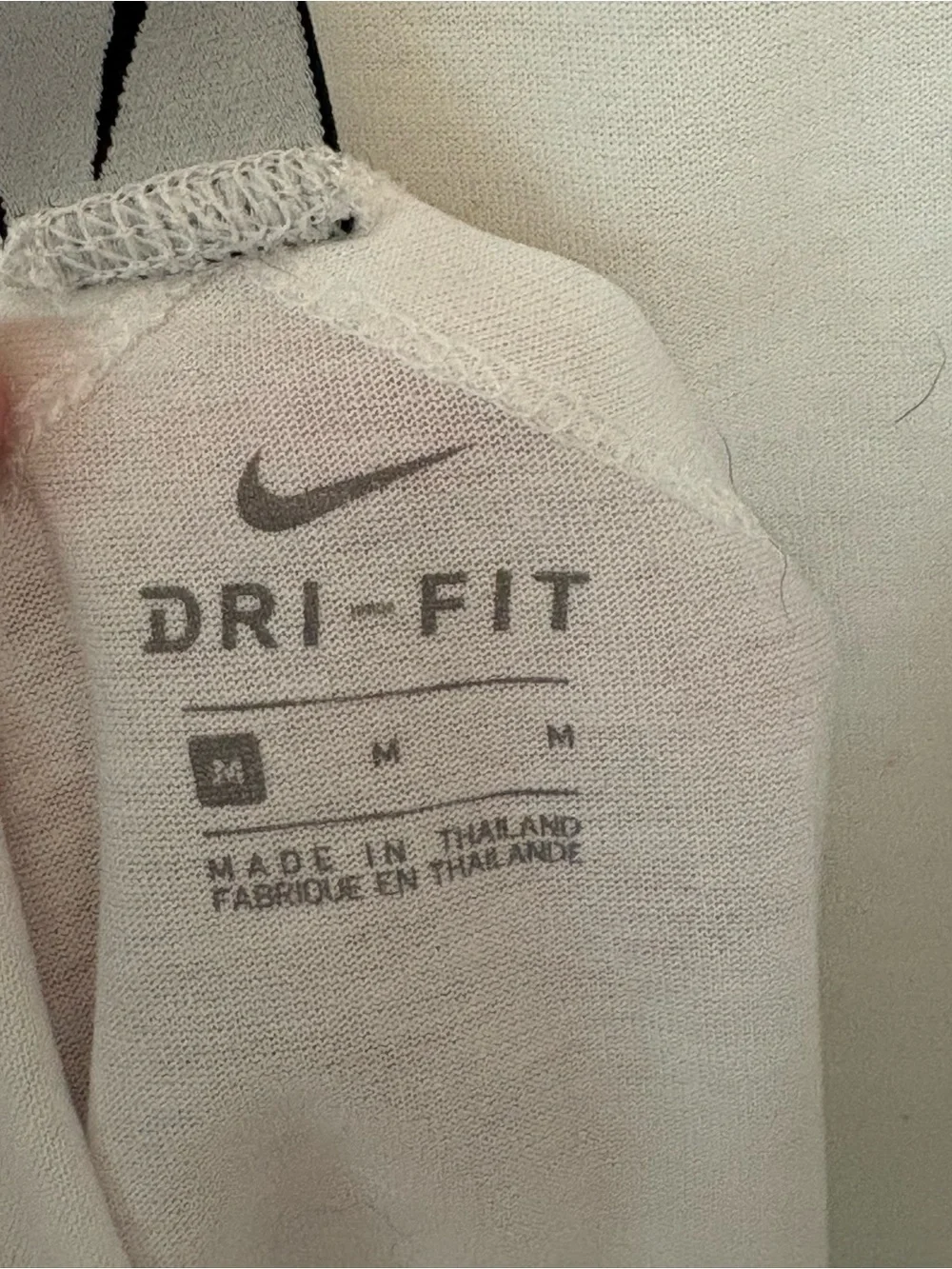 Nike White Women's Racerback Tank with Black Swoosh